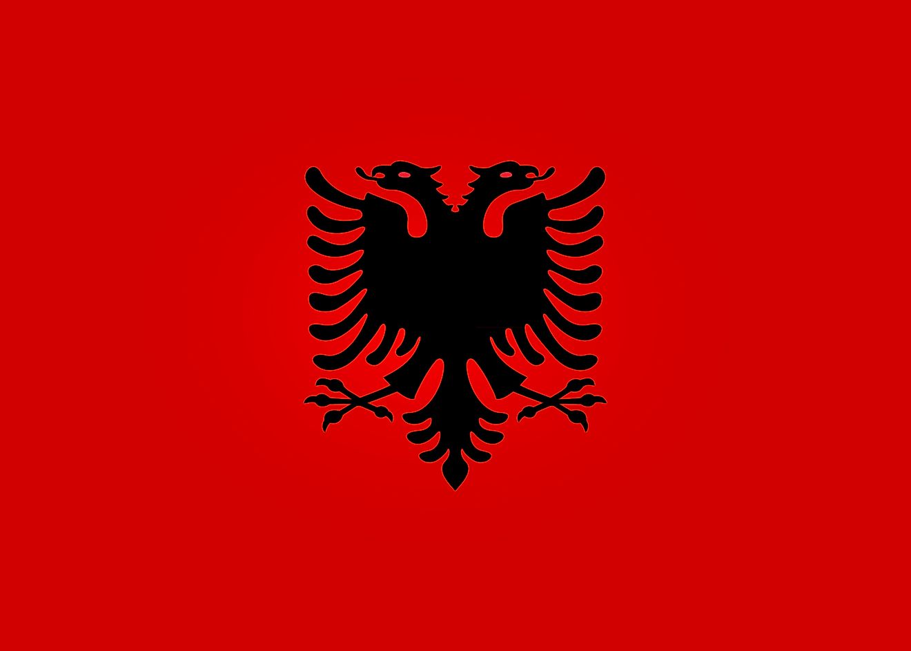 The National Flag of Albania - Flamuri Kombëtar  features a red background with a double-headed eagle placed in the center.