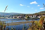 Town of La Malbaie in Quebec, with buildings set against a forested hillside