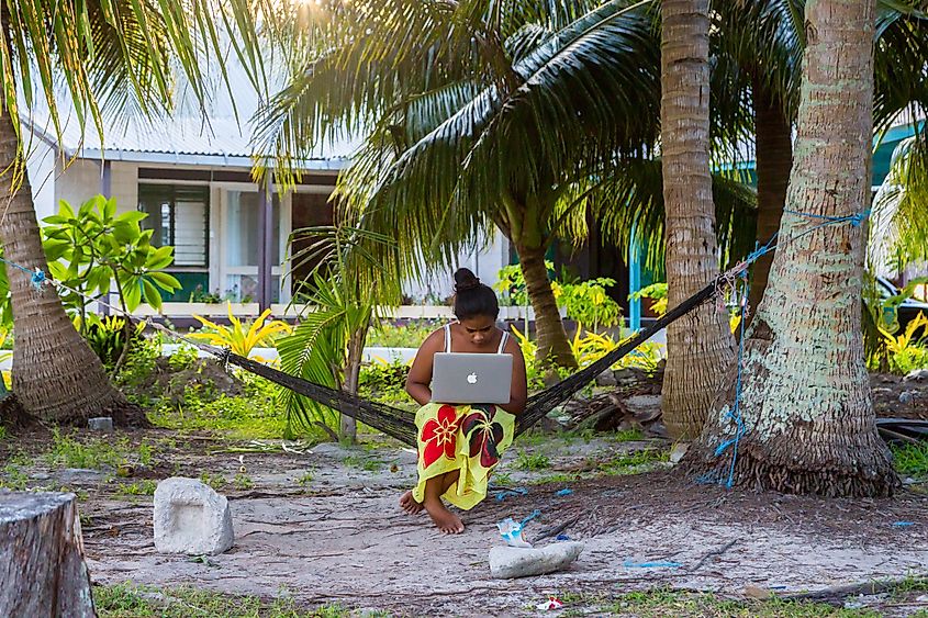 Young Polynesian woman in Vaiaku, Tuvalu. Editorial credit: maloff / Shutterstock.com