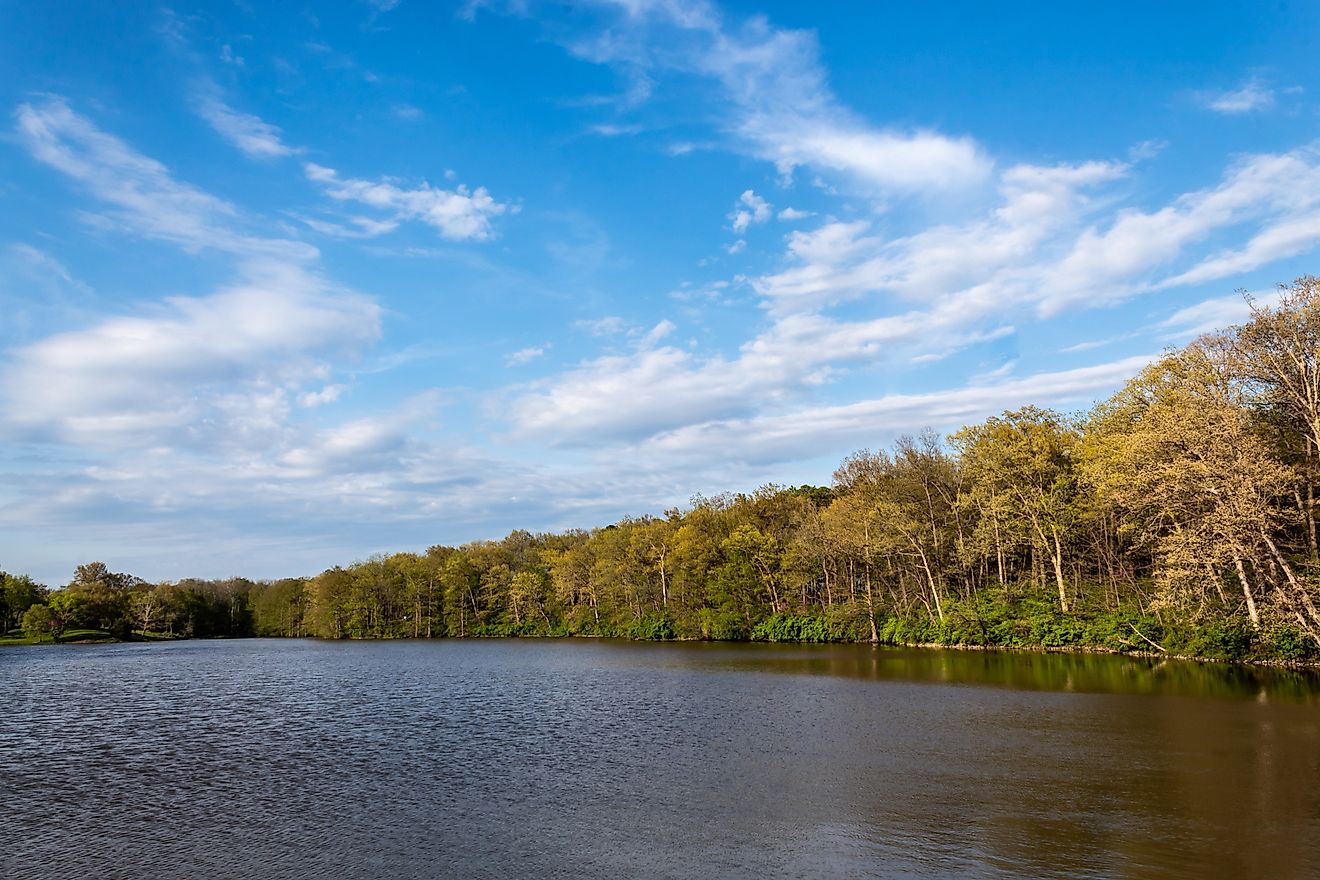 Editorial Photo Credit: Laurie A. Smith via Shutterstock. Beautiful scenic view from the West dam on Patriot`s Park Lake, near Greenville, IL. Formerly Old City Lake, constructed in 1933, is a centerpiece resource in Bond County.