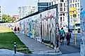 A remnant of the Berlin Wall in Berlin, Germany. Image credit: Aleksandr Dyskin / Shutterstock.com.